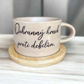 Ochranný hrnek proti debilům.